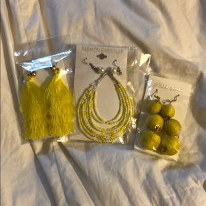 Two earrings sets and a bracelet. New!
